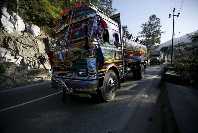 Nepalese petrol tankers heading to the Chinese border of Kerung are pictured on a road on the outskirts of Kathmandu, Nepal November 2, 2015. Nepal signed a deal last Wednesday with China to import petroleum products, its embassy in Beijing said, as the Himalayan nation tries to boost supplies to deal with a deepening fuel crisis. (Photo by Navesh Chitrakar/Reuters)