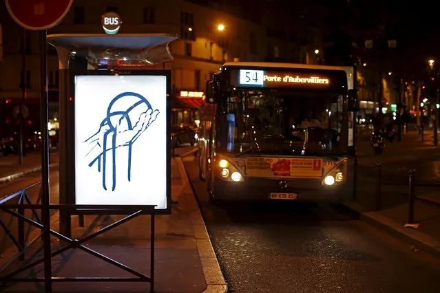 A poster by street artist Paul Insect as part of the "Brandalism" project is displayed at a bus stop in Paris, France, November 28, 2015, ahead of the United Nations COP21 Climate Change conference in Paris. (Photo by Benoit Tessier/Reuters)