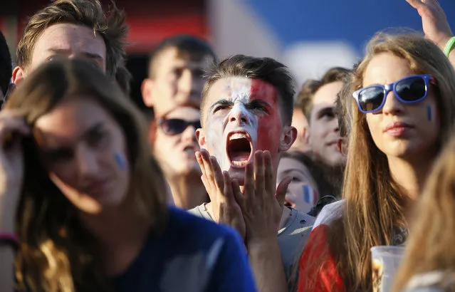 A French fan reacts during the Russia 2018 World Cup Group C football match between France and Peru at the Ekaterinburg Arena in Ekaterinburg on June 21, 2018. (Photo by Gleb Garanich/Reuters)