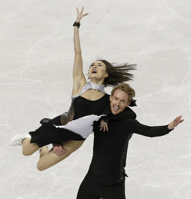 Madison Chock and Evan Bates perform during their free dance program at the U.S. Figure Skating Championships in Greensboro, N.C., Saturday, January 24, 2015. (Photo by Chuck Burton/AP Photo)