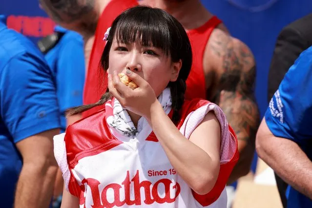 Mayoi Ebihara competes in the 2023 Nathan's Famous Fourth of July International Hot Dog Eating Contest at Coney Island in New York City, U.S., July 4, 2023. (Photo by Amr Alfiky/Reuters)