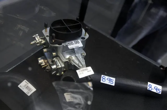 A carburetor with a price tag of 260 Cuban Convertible Pesos (approximately US$284) is on display along with other parts in a government-run store in Havana February 7, 2015. (Photo by Enrique De La Osa/Reuters)
