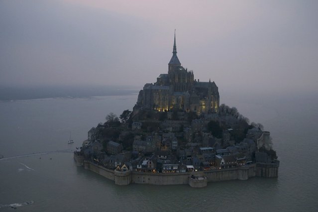 An aerial view shows the Mont Saint-Michel off France's Normandy coast March 20, 2015. (Photo by Pascal Rossignol/Reuters)