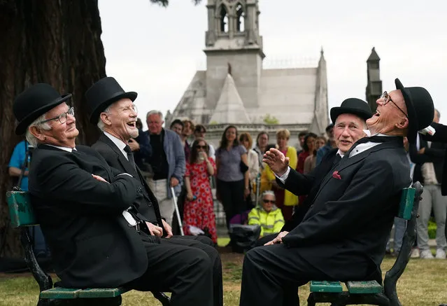 Members of the Joycestagers during their reenactment from the “Hades” chapter of Ulysses at Glasnevin Cemetery, Dublin on June 16, 2022, as part of the annual Bloomsday celebrations. Bloomsday is a celebration of the life of Irish writer James Joyce, observed annually worldwide on June 16, the day his 1922 novel Ulysses takes place in 1904, the date of his first outing with his wife-to-be Nora Barnacle. The day is named after its protagonist Leopold Bloom. (Photo by Brian Lawless/PA Images via Getty Images)