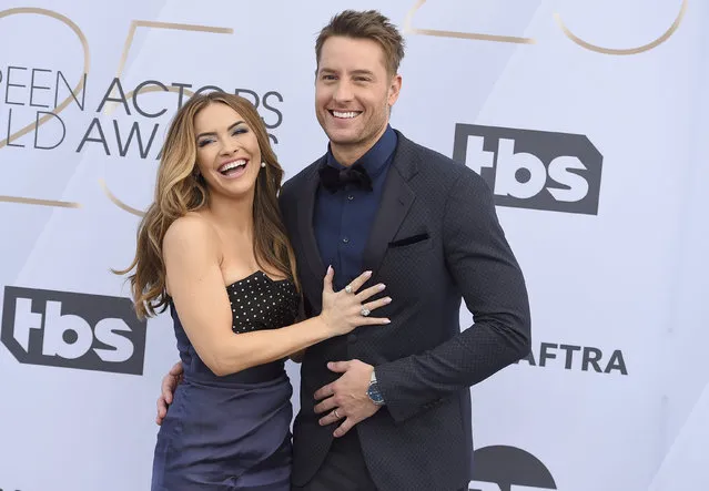 Chrishell Stause, left, and Justin Hartley arrive at the 25th annual Screen Actors Guild Awards at the Shrine Auditorium & Expo Hall on Sunday, January 27, 2019, in Los Angeles. (Photo by Jordan Strauss/Invision/AP Photo)