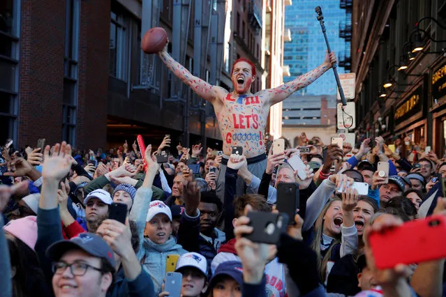 Fans cheer during a victory parade for the New England Patriots after winning Super Bowl LIII, in Boston, Massachusetts, U.S., February 5, 2019. (Photo by Brian Snyder/Reuters)