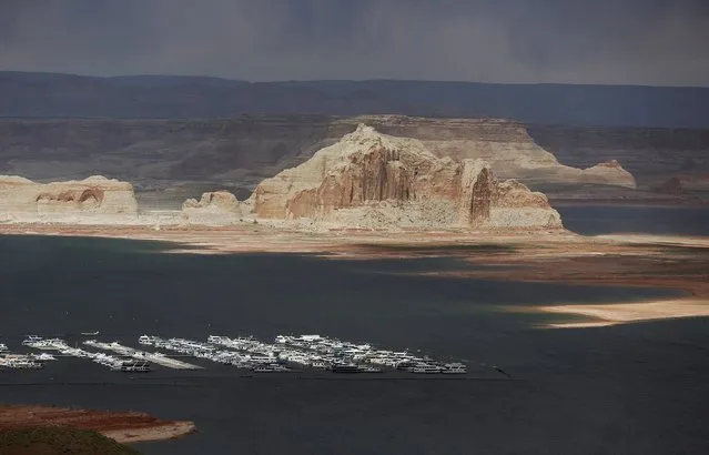 Boats can be seen with low water levels of the Colorado River fed Lake Powell outside Page, Arizona, April, 14, 2015. (Photo by Jim Urquhart/Reuters)