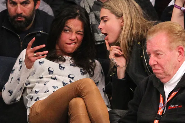 Detroit Pistons vs. New York Knicks at Madison Square Garden, January 7, 2014. Actress Michelle Rodriguez and model Cara Delevingne sitting in the front row during the 4th quarter. The two were hugging and touching each other and Rodriguez appeared to be very intoxicated. (Photo by Charles Wenzelberg/New York Post)