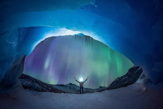 A pair of ice climbers have been snapped in front of a stunning aurora. Mike Stuart and Takeshi Tani were climbing the Athabasca Glacier in Alberta, Canada, when the aurora lit up the nights sky. They were photographed by famed night-time photographer Paul Zizka, who specialises in photographing auroras in some of Canadas most beautiful parks. (Photo by Paul Zizka/Caters News)