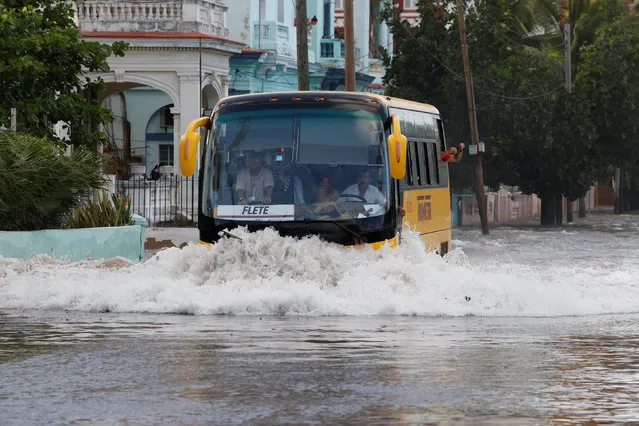 A public bus travels on a flooded street in Havana, Cuba, January 23, 2017. (Photo by Reuters/Stringer)