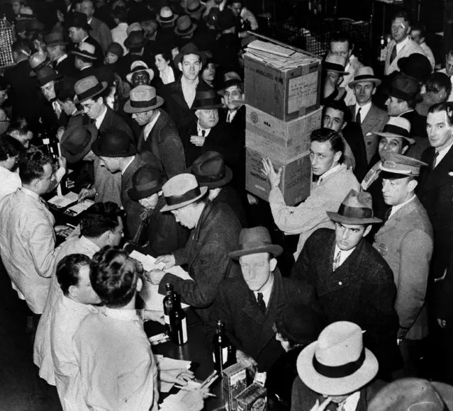 As soon as the prohibition repeal was ratified, wholesale houses got busy delivering the goods to anxious customers, as seen in New York, December 5, 1933.  The first shipment from the the historic winery of Mouquin Inc. in Brooklyn, is shown leaving the warehouse for Roth's. (Photo by AP Photo)