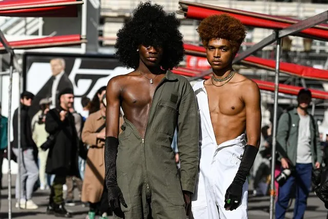 Guests are seen outside the Raf Simons show during Paris Fashion Week S/S 2022 on September 30, 2021 in Paris, France. (Photo by Daniel Zuchnik/Getty Images)