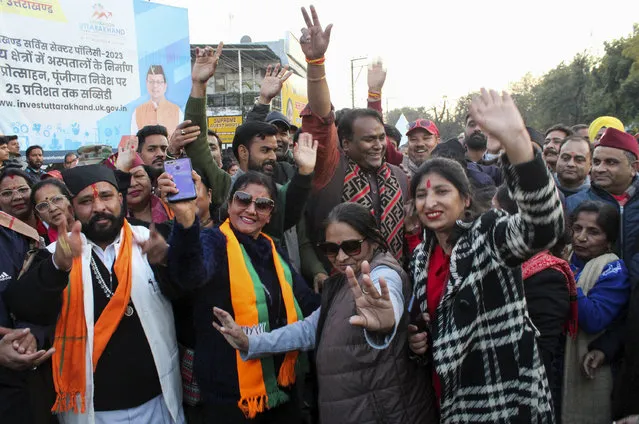 India's Bharatiya Janata Party supporters celebrate after Uttarakhand state lawmakers passed a uniform marriage law for all religions in Dehradun, India, Wednesday, February 7, 2024. The northern Indian state on Wednesday approved an unprecedented uniform code for marriage, divorce, adoption and inheritance for Hindus, Muslims and other religious communities under a new law that also requires couples that live together to register with the government or face punishment. (Photo by AP Photo)