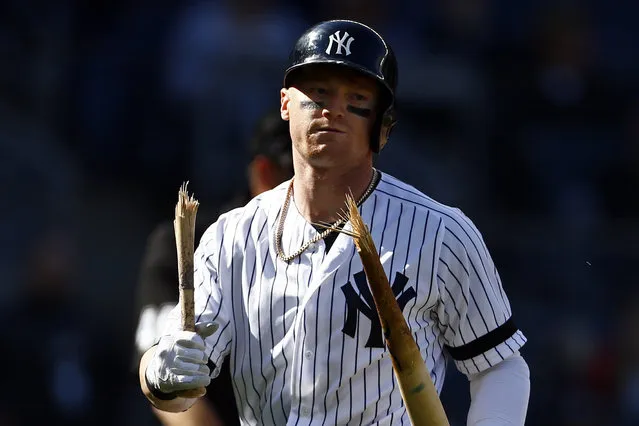New York Yankees' Clint Frazier walks back to the dugout with a broken bat after striking out to end the ninth inning of a baseball game against the Kansas City Royals on Sunday, April 21, 2019, in New York. (Photo by Adam Hunger/AP Photo)
