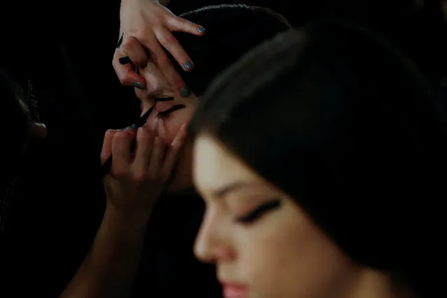 Models get made up for the Alvarno's Fall/Winter 2017 show during the Mercedes-Benz Fashion Week in Madrid, Spain February 20, 2017. (Photo by Susana Vera/Reuters)