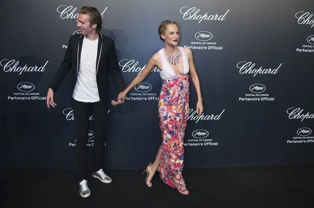 Model Poppy Delevingne and her husband James Cook pose during a photocall ahead of the Chopard Gold Party during the 68th Cannes Film Festival in Cannes, southern France, May 18, 2015. (Photo by Yves Herman/Reuters)