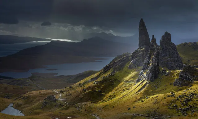 Lighting the Old Man, Scotland. On a stormy autumn day, the photographer captures a fleeting shaft of light that illuminates the Old Man of Storr and other pinnacles of the Trotternish Ridge on the Isle of Skye. (Photo by Garry Ridsdale/Smithsonian Photo Contest)