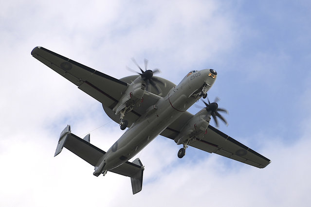 An E-2 early warning aircraft flies near an airbase in southern Taiwan's Pingtung county on Tuesday, January 30, 2024. Taiwan is holding spring military drills following its recent presidential election and amid threats from China, which claims the island as its own territory that it is determined to annex, possibly by force.(Photo by Johnson Lai/AP Photo)