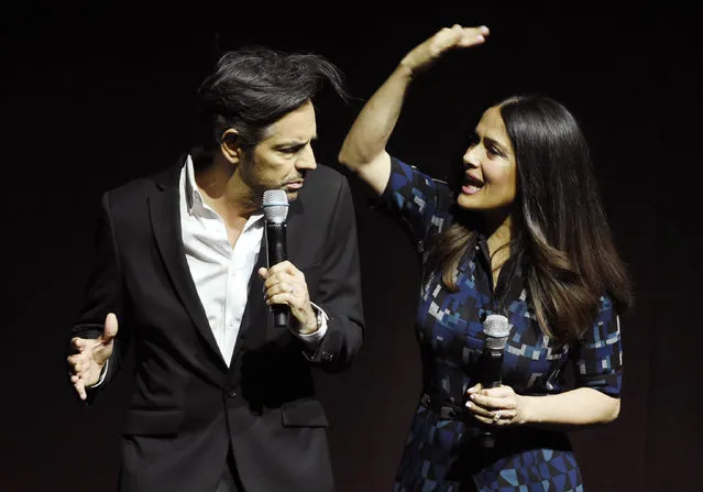 Salma Hayek, right, a cast member in the upcoming film “How to Be a Latin Lover”, playfully slaps fellow cast member Eugenio Derbez as they discuss the film during the Lionsgate presentation at CinemaCon 2017 at Caesars Palace on Thursday, March 30, 2017, in Las Vegas. (Photo by Chris Pizzello/Invision/AP Photo)