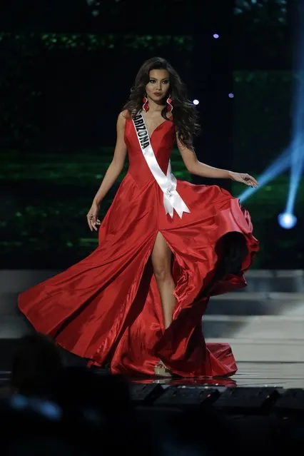 Miss Arizona, Maureen Montagne, competes in the evening gown competition during the preliminary round of the 2015 Miss USA Pageant in Baton Rouge, La., Wednesday, July 8, 2015. (Photo by Gerald Herbert/AP Photo)