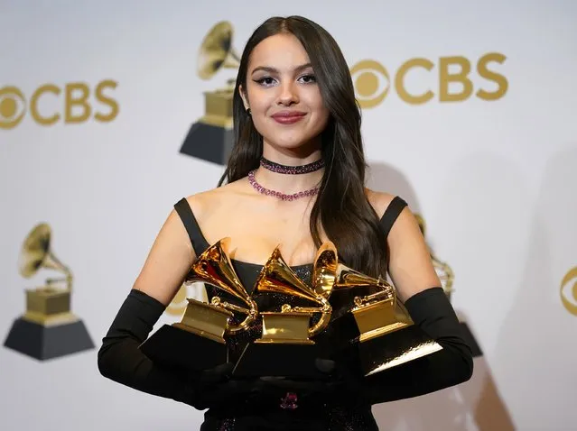 Olivia Rodrigo, winner of the awards for best pop vocal album for “Sour”, best new artist and best pop solo performance for “drivers license”, poses in the press room at the 64th Annual Grammy Awards at the MGM Grand Garden Arena on Sunday, April 3, 2022, in Las Vegas. (Photo by John Locher/AP Photo)