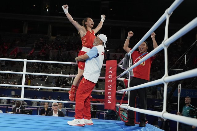 China's Chang Yuan celebrates after defeating Turkey's Hatice Akbas in their women's 54 kg final boxing match at the 2024 Summer Olympics, Thursday, August 8, 2024, in Paris, France. (Photo by John Locher/AP Photo)