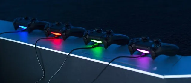 PlayStation controllers are pictured before a Sony Computer Entertainment America media briefing before the opening day of the Electronic Entertainment Expo, or E3, at the Memorial Sports Arena in Los Angeles, June 9, 2014.  REUTERS/Mario Anzuoni