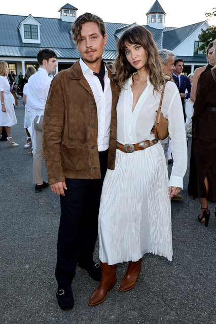 American actor and photographer Cole Sprouse and Internet personality Ari Fournier attend Ralph Lauren fashion show during New York Fashion Week September 2024 at Khalily Stables on September 05, 2024 in Bridgehampton, New York. (Photo by Theo Wargo/Getty Images)