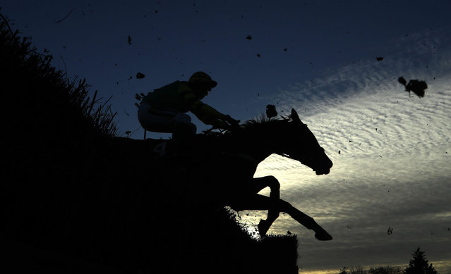 A competitor jumps during the Weatherbys & Birdie Calendars Mars' Handicap Steeple Chase at Kempton Park on November 11, 2024 in Sunbury, England. (Photo by Warren Little/Getty Images)
