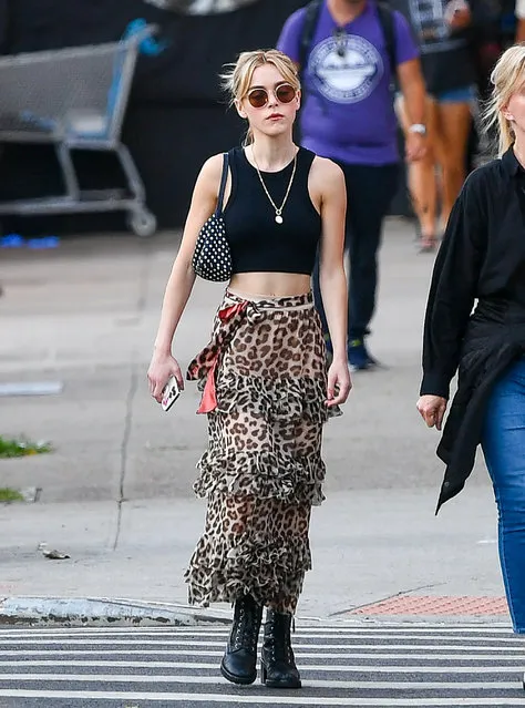 Kiernan Shipka is spotted out and about in New York City on August 14, 2022. The 22 year old actress wore a black crop top, animal print skirt, and black boots. (Photo by The Image Direct)