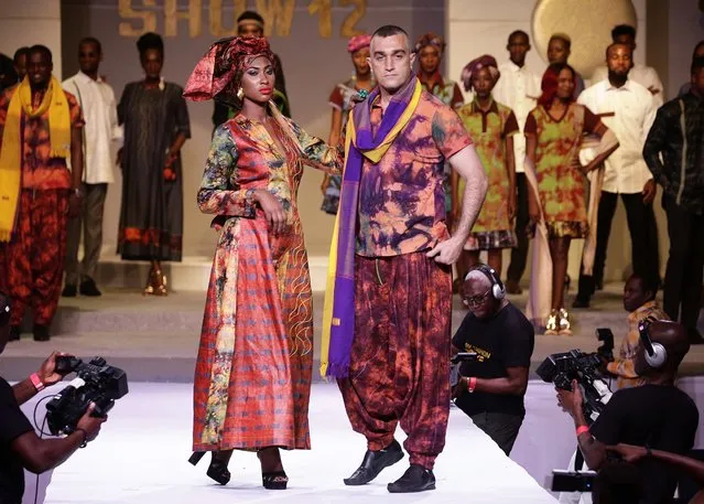 Models presents creations by Ivorian designer Pathe'O during the 12th edition of the Afrik Fashion Show in Abidjan, Ivory Coast, 07 October 2017. (Photo by Legnan Koula/EPA/EFE)
