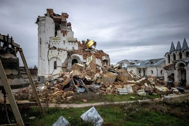 This photograph taken on November 2, 2022, shows a part of the destroyed Orthodox Svyato-Heorhiyivs?kyy Skyt of the Sviatohirsk Cave Monastery in the village of Dolina near Svyatohirs'k, Donetsk region, amid the Russian invasion of Ukraine. (Photo by Dimitar Dilkoff/AFP Photo)