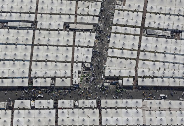 An aerial view of the tents of Muslim pilgrims is seen on the second day of Eid al-Adha in Mina, near the holy city of Mecca, during the annual haj pilgrimage September 25, 2015. (Photo by Ahmad Masood/Reuters)