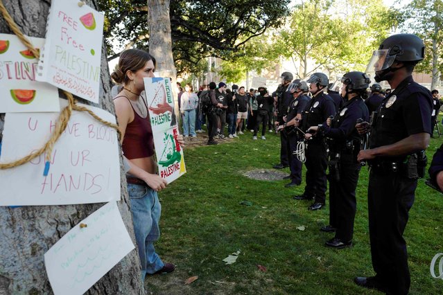 LAPD surrounds students protesting in support of Palestinians at an encampment at the University of Southern California’s Alumni Park, as the conflict between Israel and the Palestinian Islamist group Hamas continues, in Los Angeles, California, U.S., April 24, 2024. (Photo by Zaydee Sanchez/Reuters)