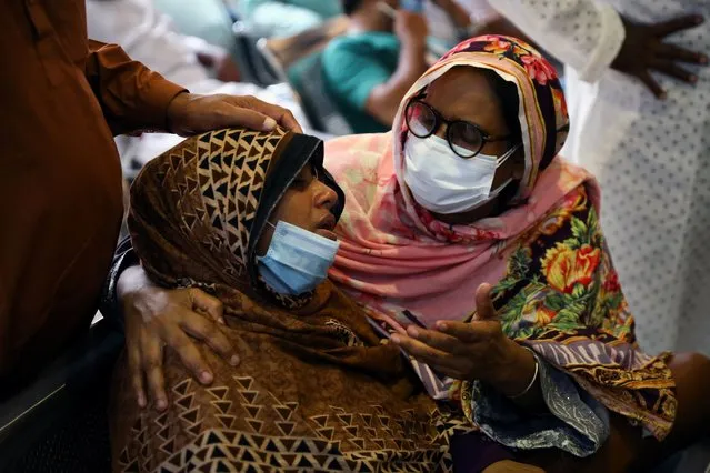 Relatives of victims mourn at a hospital, after a gas pipeline blast at a mosque in Narayanganj, near Dhaka, Bangladesh, September 5, 2020. (Photo by Mohammad Ponir Hossain/Reuters)