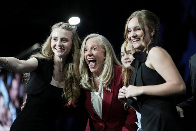 Democrat Abigail Spanberger with her family on stage after her victory speech over Republican Winsome Earle-Sears in Virginia's race for governor in Richmond, Virginia, U.S. November 4, 2025. (Photo by Jay Paul/Reuters)