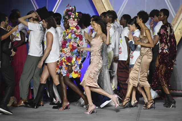 Model Bella Hadid, centre, walks the runway with other models at the end of the Fashion For Relief 2018 event during the 71st international film festival, Cannes, southern France, Sunday, May 13, 2018. (Photo by Arthur Mola/Invision/AP Photo)