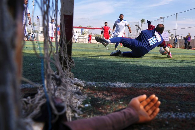 Palestinians, some of whom were injured in the Hamas-Israel conflict and some in previous conflicts, compete in a soccer tournament for amputees in Deir al-Balah, Gaza, on Monday, November 17, 2025. (Photo by Jehad Alshrafi/AP Photo)