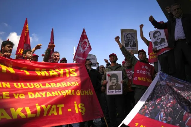 Trade union members shout slogans during Labor day celebrations at Taksim square in Istanbul, Turkey, Monday, May 1, 2023. As in previous years, police in Turkey prevented a group of demonstrators from reaching Istanbul's main square Taksim, and detained around a dozen protesters. Meanwhile, small groups were allowed to enter Taksim to lay wreaths at a monument there. (Photo by Francisco Seco/AP Photo)