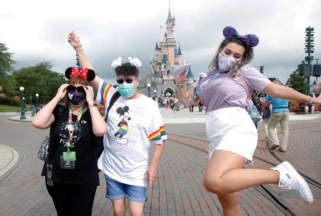 First visitors arrive at Disneyland Paris as the theme park reopens its doors to the public in Marne-la-Vallee, near Paris, following the coronavirus disease (COVID-19) outbreak in France, July 15, 2020. (Photo by Charles Platiau/Reuters)