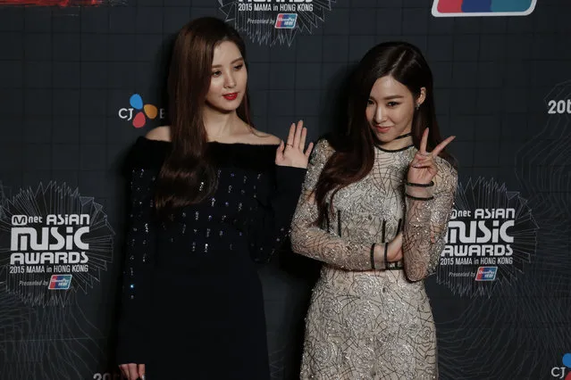 South Korean actress singers Tiffany (R) and Seohyun pose on the red carpet during 2015 Mnet Asian Music Awards (MAMA) in Hong Kong, China December 2, 2015. (Photo by Bobby Yip/Reuters)