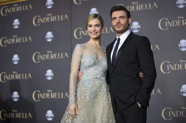 Cast members Lily James and Richard Madden pose at the premiere of "Cinderella" at El Capitan theatre in Hollywood, California March 1, 2015. The movie opens in the U.S. on March 13. REUTERS/Mario Anzuoni  (UNITED STATES - Tags: ENTERTAINMENT)