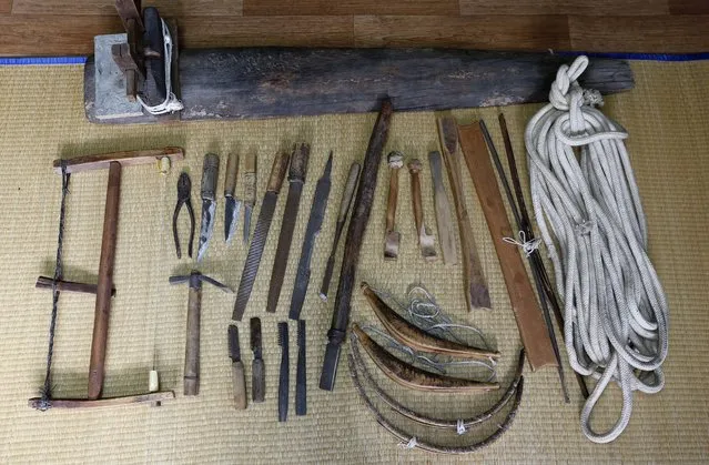 Tools for making a traditional bow are on display at the workshop of South Korean bow artisan Kwon Yeong-Hak in Yecheon-gun, Gyeongsangbuk-do, South Korea, 26 February 2015. (Photo by Jeon Heon-Kyun/EPA)