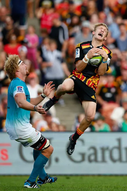 Damian McKenzie of the Chiefs collects the high ball during the round seven Super Rugby match between the Chiefs and the Cheetahs at Waikato Stadium on March 28, 2015 in Hamilton, New Zealand. (Photo by Phil Walter/Getty Images)