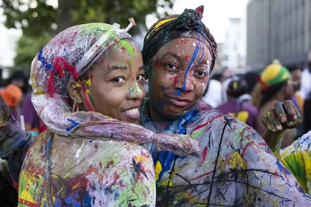 Revellers covered in paint as the opening of the Notting Hill carnival begins with “J'Ouvert” on August 28, 2022 in London, England. The Notting Hill Carnival has returned after a two year break due to the Coronavirus pandemic. (Photo by Dan Kitwood/Getty Images)