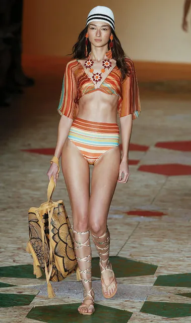 A model wears a creation from the Salinas Summer collection during Sao Paulo Fashion Week in Sao Paulo, Brazil, Wednesday, April 15, 2015. (Photo by Andre Penner/AP Photo)