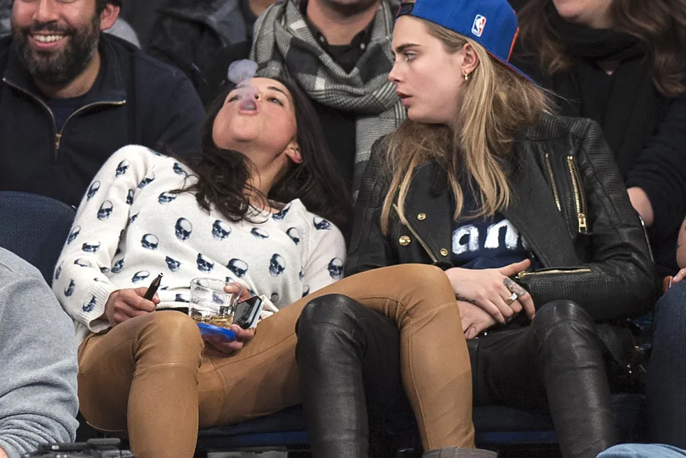 Michelle Rodriguez & Cara Delevigne Share Drunk Kiss at Knicks Game