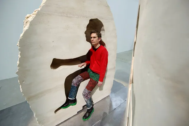 French artist Abraham Poincheval poses inside his artwork “Pierre” (“Stone”) in Paris, France, February 2, 2017 as he presents his upcoming project, living inside a rock for a week from February 22. (Photo by Benoit Tessier/Reuters)