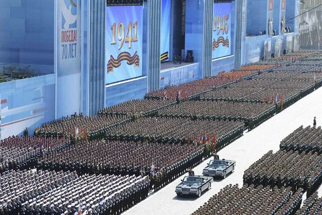 Russian Defence Minister Sergei Shoigu reviews troops during the Victory Day parade at Red Square in Moscow, Russia, May 9, 2015. (Photo by Reuters/Host Photo Agency/RIA Novosti)