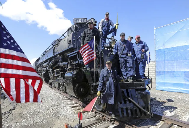 The crew from the Big Boy, No. 4014 pose for a photograph during the commemoration of the 150th anniversary of the Transcontinental Railroad completion at Union Station Thursday, May 9, 2019, in Ogden, Utah. (Photo by Rick Bowmer/AP Photo)